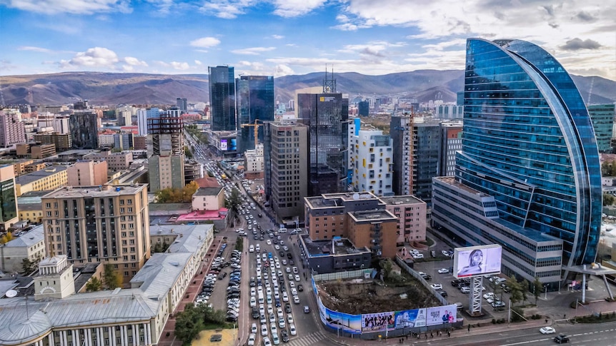 A wide landscape shot of the Mongolian capital city of Ulaanbaatar