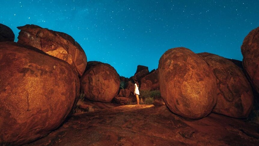 Devils Marbles with a starry sky above.