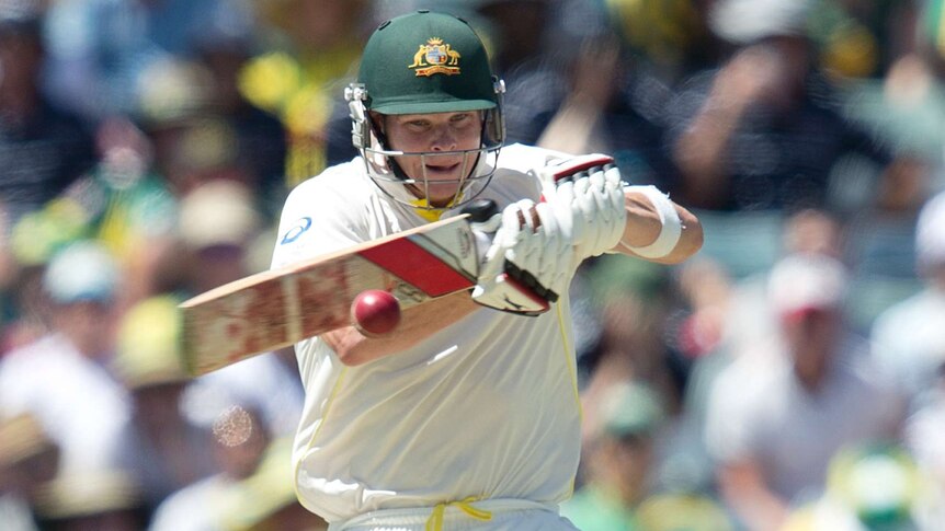 Steve Smith hits a boundary on day one of the third Ashes Test at the WACA.