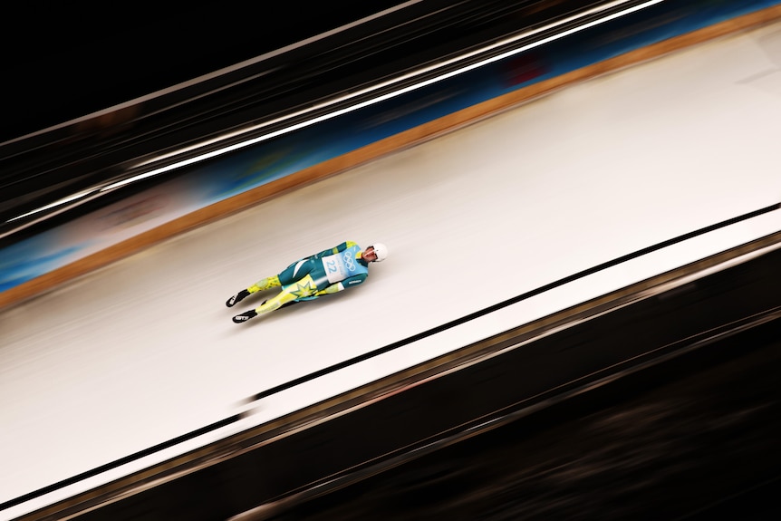 Australia's Alexander Ferlazzo slides during the Men's Singles Luge heats at the Beijing Olympics