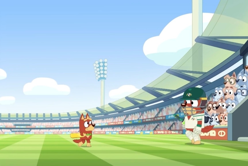 Rusty, a cartoon dog, walks off The Gabba as another dog in cricket kit walks on