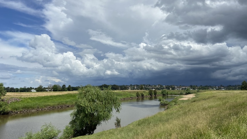 A canal-like river through farmland.