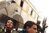 On patrol: Rebel paratroopers and anti-government fighters in Benghazi