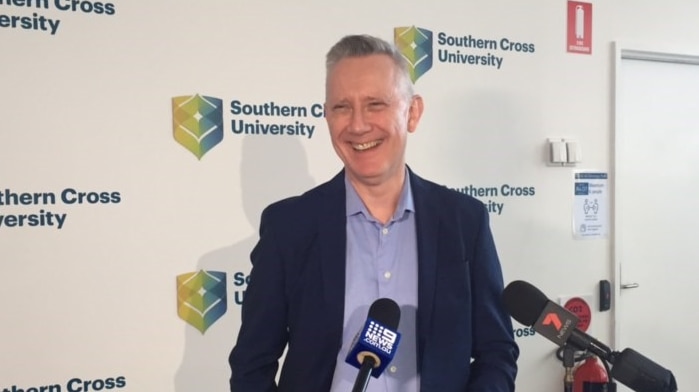 Vice-Chancellor Adam Shoemaker addresses media at SCU Gold Coast campus