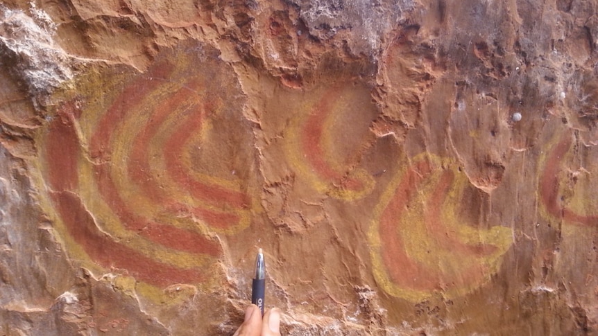 ochre paintings in a rock shelter