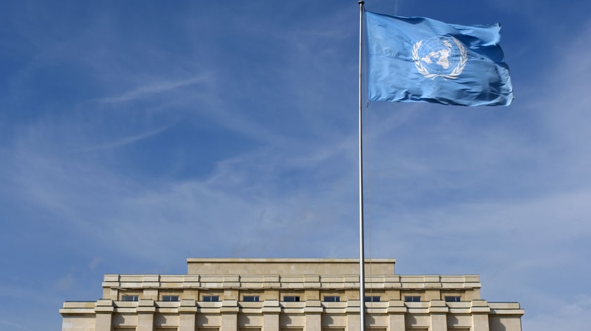 United Nations flag flying outside Geneva UN headquarters (Reuters: Denis Balibouse)