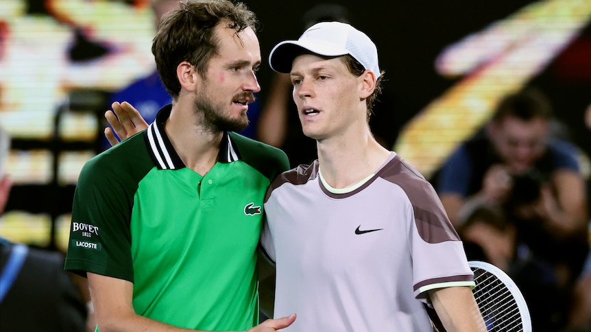 Jannik Sinner is congratulated by Daniil Medvedev after winning the 2024 Australian Open.