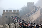 A large crowd covers the main walkways in this image of the Great Wall of China, taken in 2011.