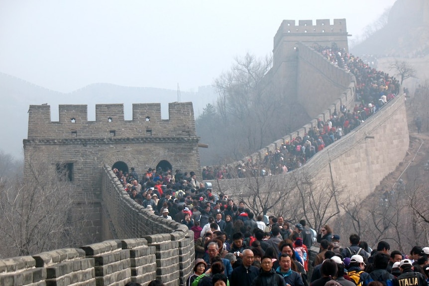 A large crowd covers the main walkways in this image of the Great Wall of China, taken in 2011.