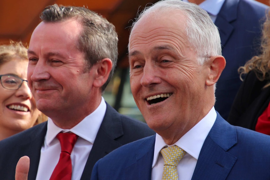 Prime Minister Malcolm Turnbull and WA Premier Mark McGowan looking jovial in headshots.