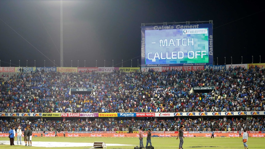 A scoreboard shows third and final Twenty20 between India and Australia in Hyderabad is called off.