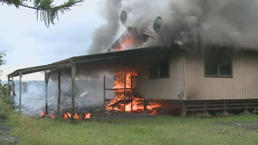 Still of lava incinerating a house on Hawaii's Big Island, November 11 2014.