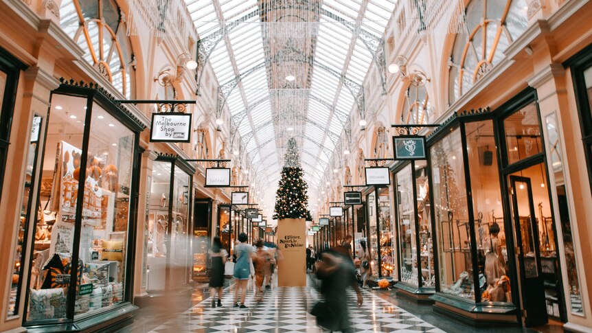 Inside of a shopping mall at Christmas time. Unsplash. 