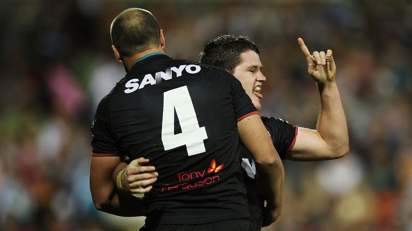 Two-up: Lachlan Coote (r) bagged a pair of important tries in Penrith's win.