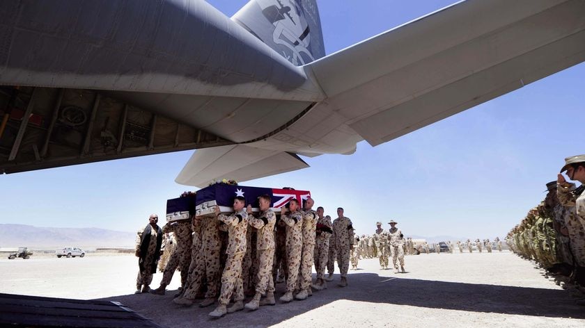Soldiers and officials have held ceremonies in Tarin Kowt and UAE to pay their last respects to the two Australian diggers.