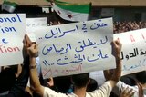 Activists say Syrian troops killed a teenage boy as protests broke out across the country.