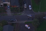 An aerial view of a police shooting at an intersection