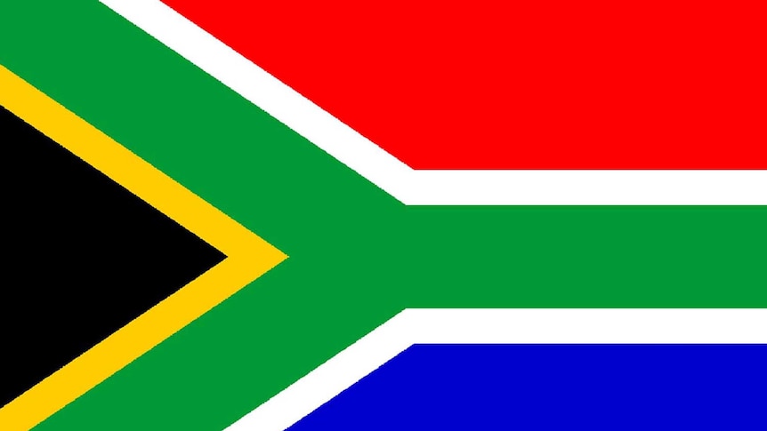 The pre-1994 South African flag (bottom) and the post-1994 flag