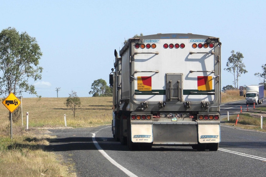 Truck driving along the Bruce Highway in Queensland