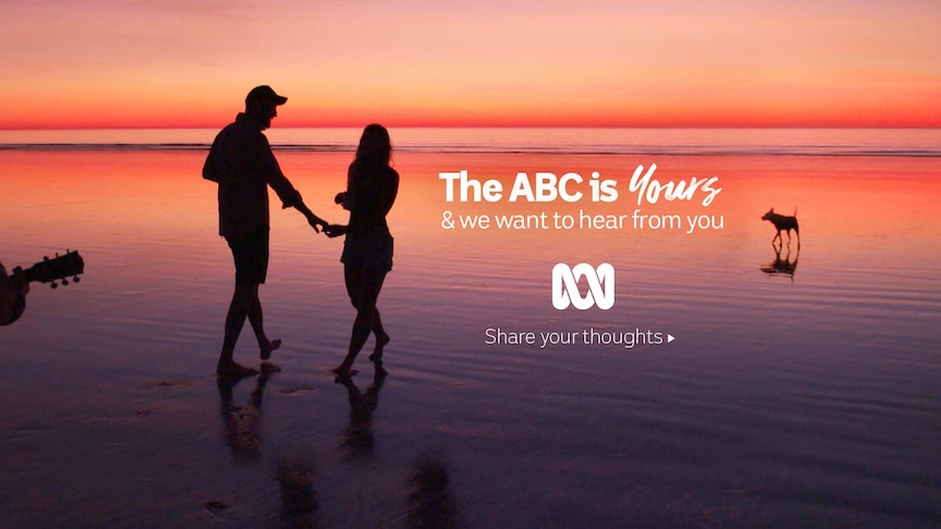 Coupe holding hands in front of sunset with text over the image