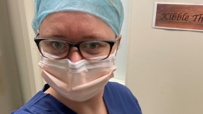 Katherine Goodall dressed in surgery scrubs