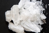 a group of white looking crystals which are a drug