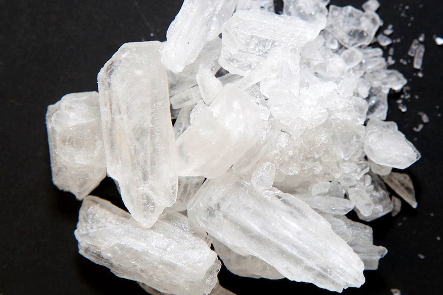 a group of white looking crystals which are a drug