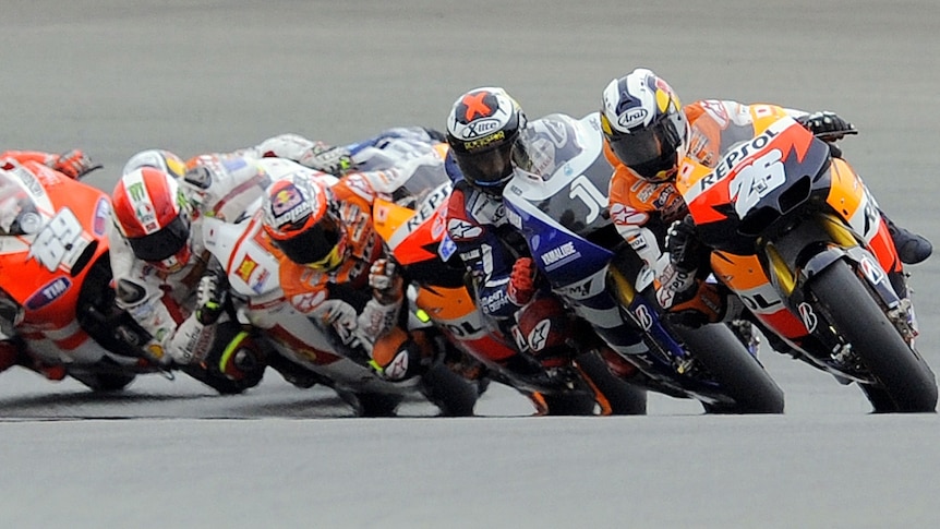 First placed Honda driver Dani Pedrosa leads the pack around a corner in MotoGP in Germany
