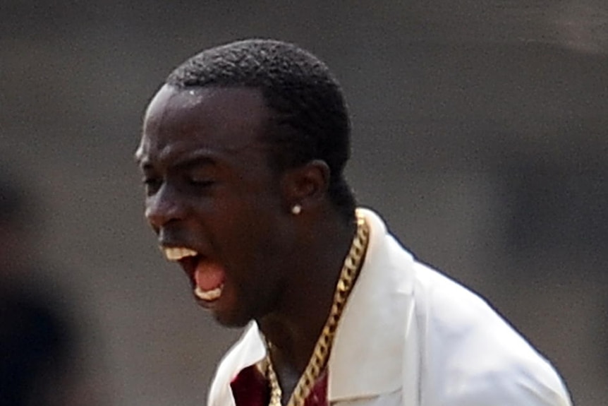 Kemar Roach snares a double for the Windies.