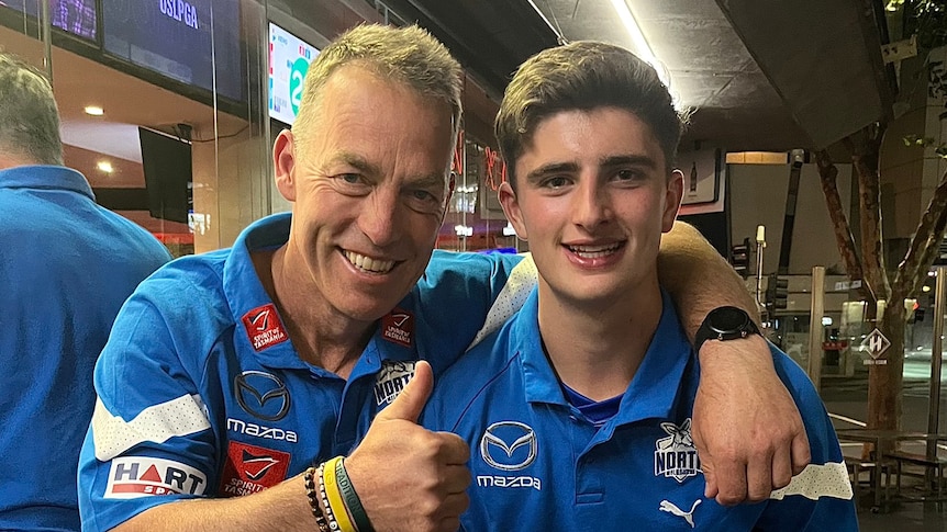 Harry Sheezel with North Melbourne coach Alastair Clarkson