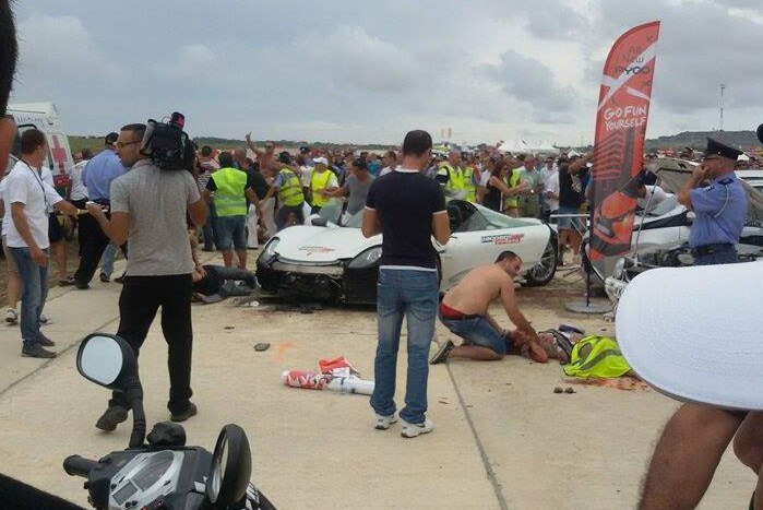 Porsche crashes into spectators