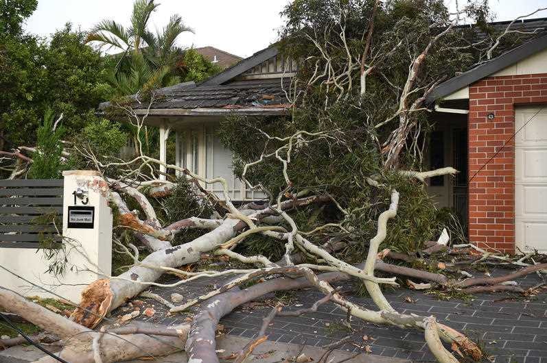 houses collapses onto the front of a suburban townhouse