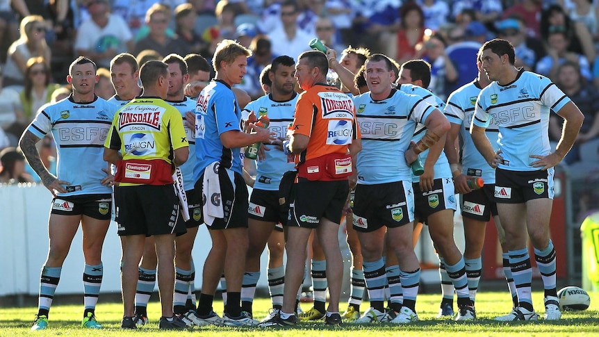 Sharks players look dejected during their round seven loss to the Bulldogs in Gosford.