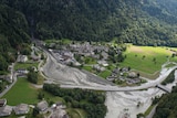 The landslide can be seen sweeping through the centre of the the village of Bondo. Picture taken from a higher vantage point.