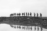 Black and white image of 1st Australian Division near Hooge near Ypres forming a silhouettte against the sky.