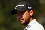 Jason Day points to the crowd during the Players Championship