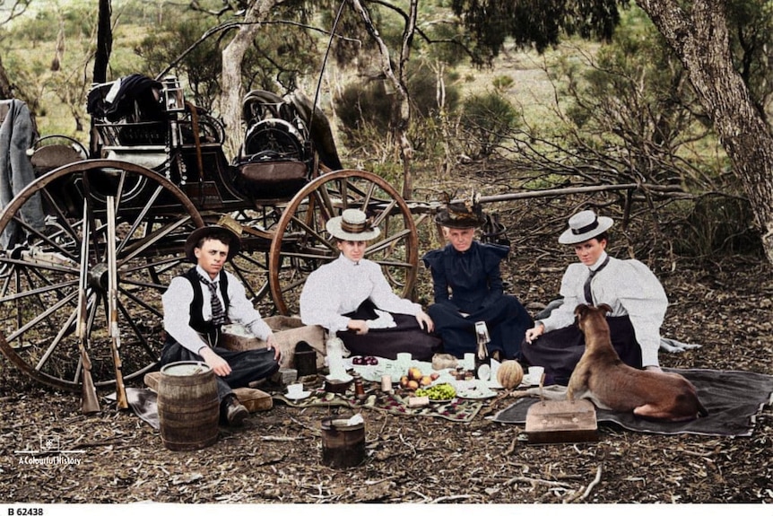 a group of people at a picnic in 1898