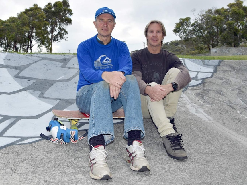 Brothers Steven and Graham Macaulay sitting at the skate park