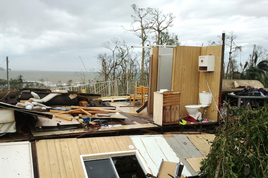 A house is destroyed with only the toilet left standing at Mission Beach.