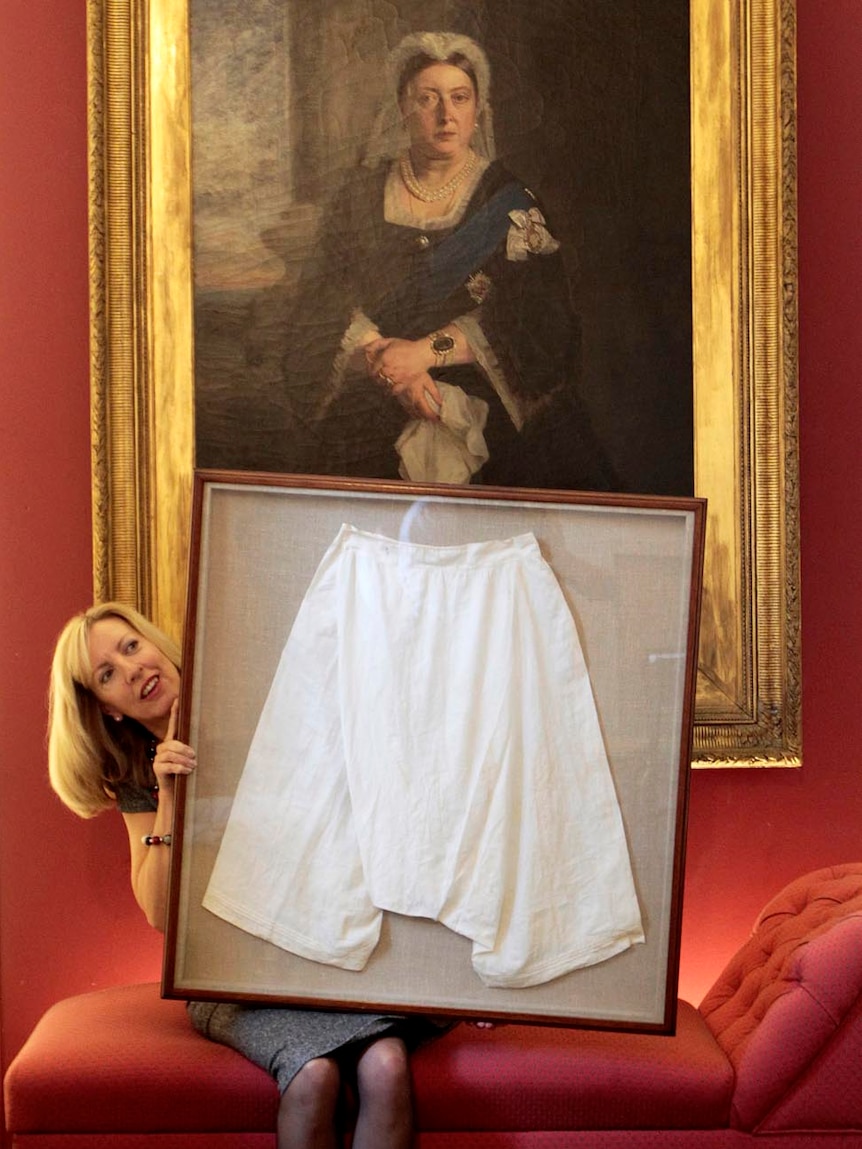 A framed pair of silk bloomers that once belonged to Queen Victoria go up for auction.