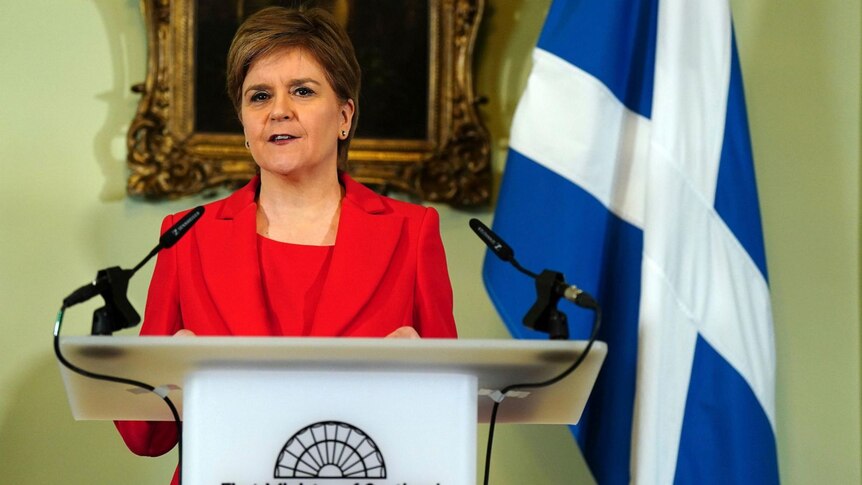 Scottish First Minister Nicola Sturgeon speaks at a lectern