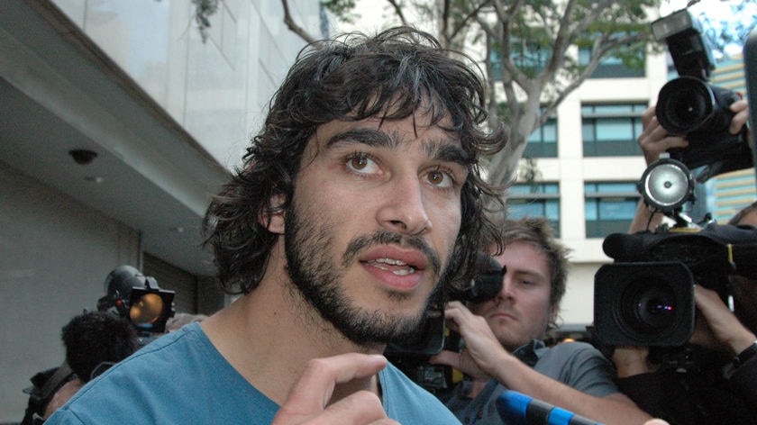 Johnathan Thurston leaves Brisbane City Watchhouse after being charged