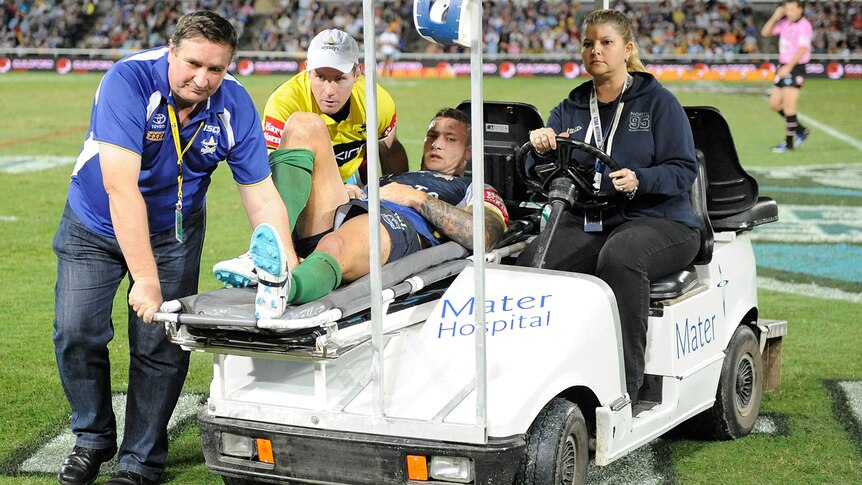 Tariq Sims is carted off the field