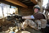 Prince Harry mans a machine gun in Helmand province, Southern Afghanistan
