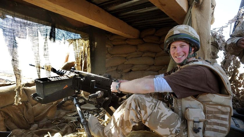 Prince Harry mans a machine gun in Helmand province, Southern Afghanistan