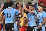 Fiji celebrates one of Marika Koroibete's tries against Papua New Guinea