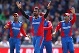 A group of Afghanistan male cricketers appeal for a wicket against England at the 2019 World Cup.