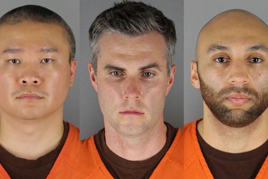 Бывшие офицеры полиции Миннеаполиса Тоу Тао, Томас Лейн и Джей Александр Кинг на фото во время задержания.