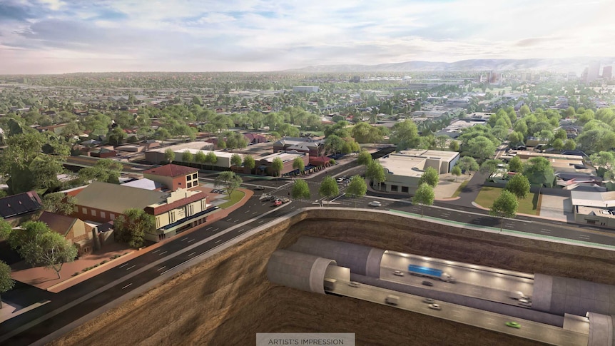 An artist's rendering of two road tunnels under another road and historic buildings