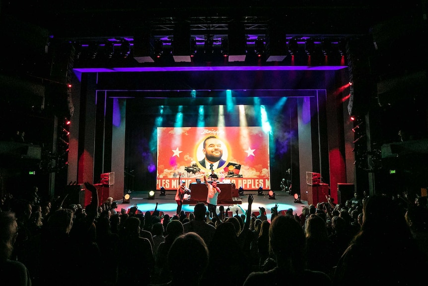 Colour photo of rappers Briggs and Nooky on stage at the Sydney Opera House.